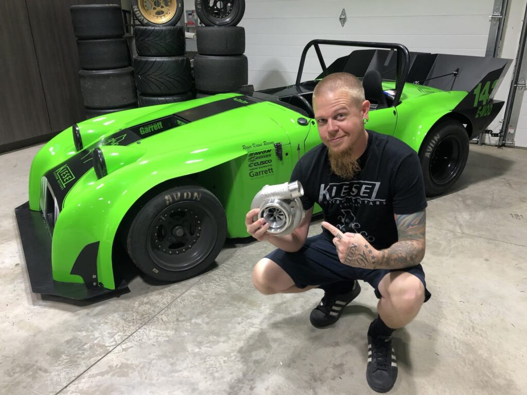 Jeff Kiesel with is 1958 Austin Healey and his Garrett GTX3071R turbo