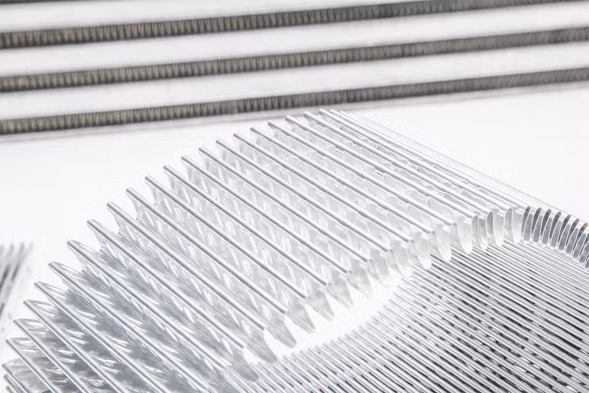 Advanced internal fin geometry in Garrett intercooler core designed to improve heat transfer efficiency