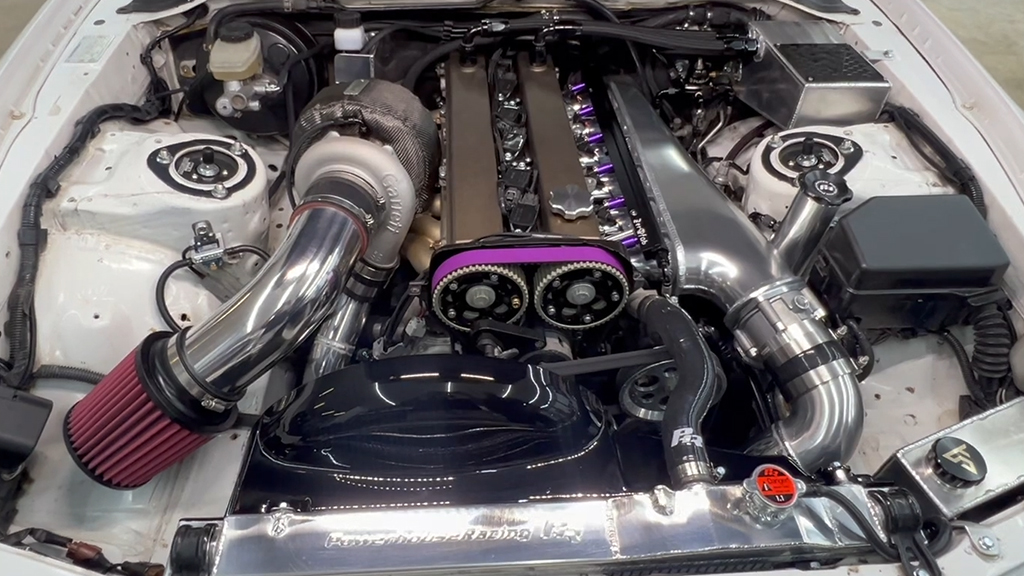 Toyota Supra 2JZ engine bay with Garrett GBC37 900 turbocharger installed